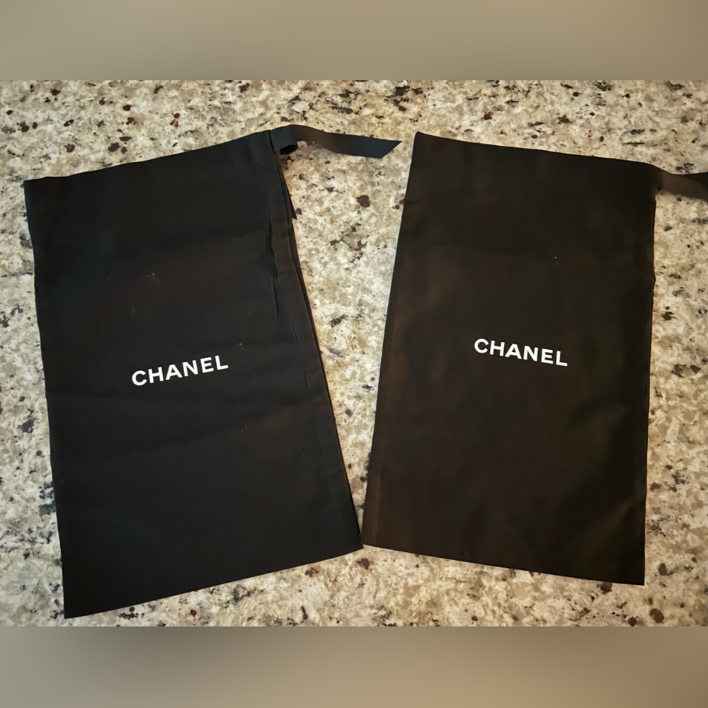 Pair of dust bags marked Chanel